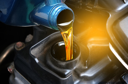 Fresh oil being poured into engine